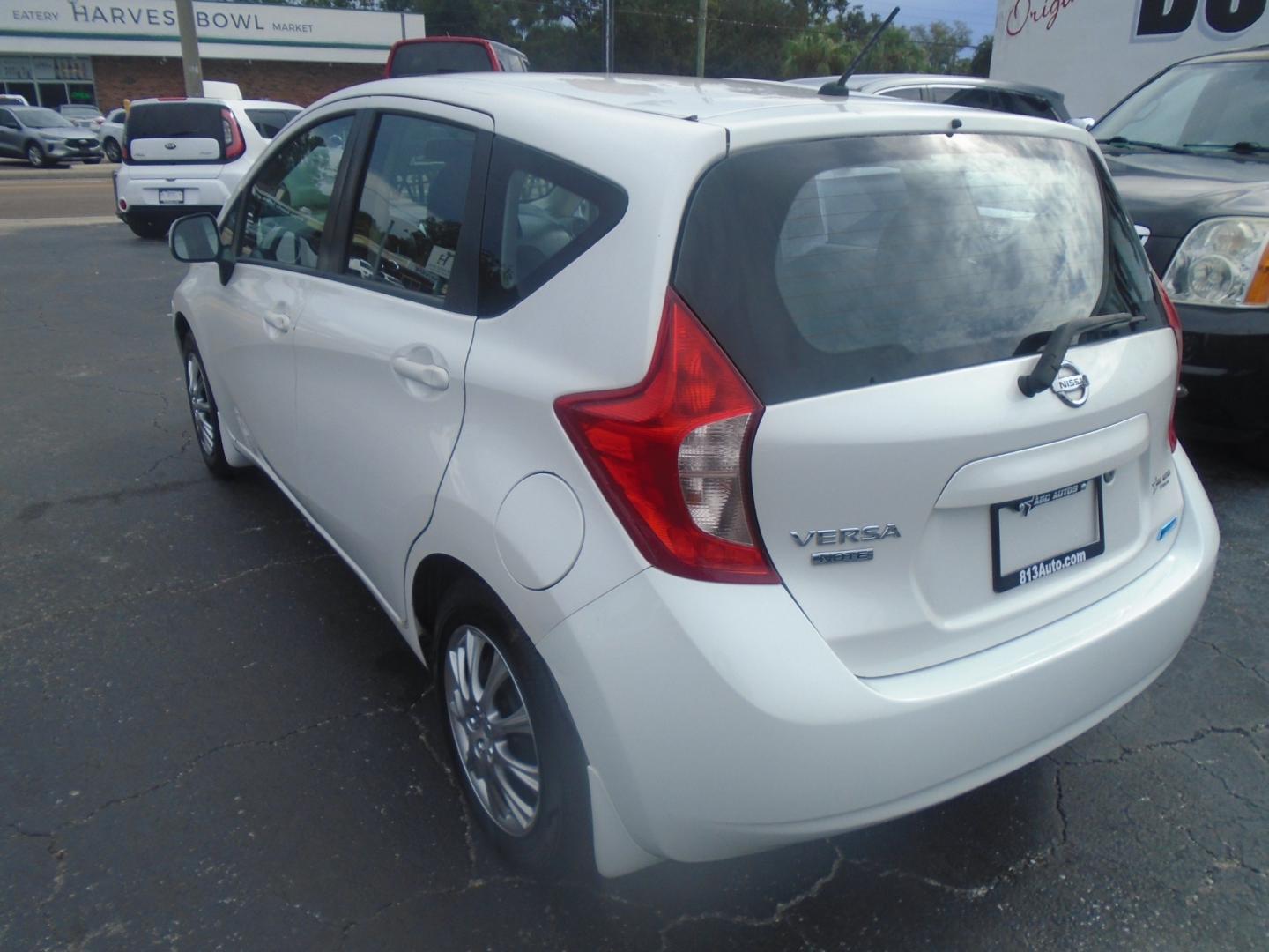 2014 Nissan Versa Note S (3N1CE2CP1EL) with an 1.6L L4 DOHC 16V engine, 5-Speed Manual transmission, located at 6112 N Florida Avenue, Tampa, FL, 33604, (888) 521-5131, 27.954929, -82.459534 - Photo#4